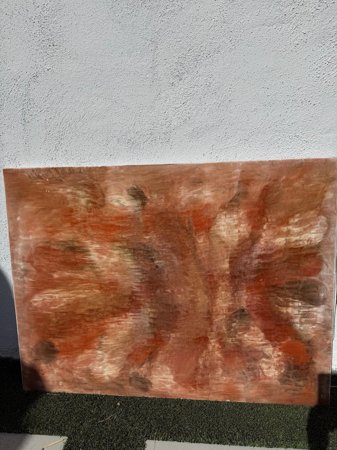 Original photograph of a copper, cream and dark-toned Resinart Finishes resin artwork