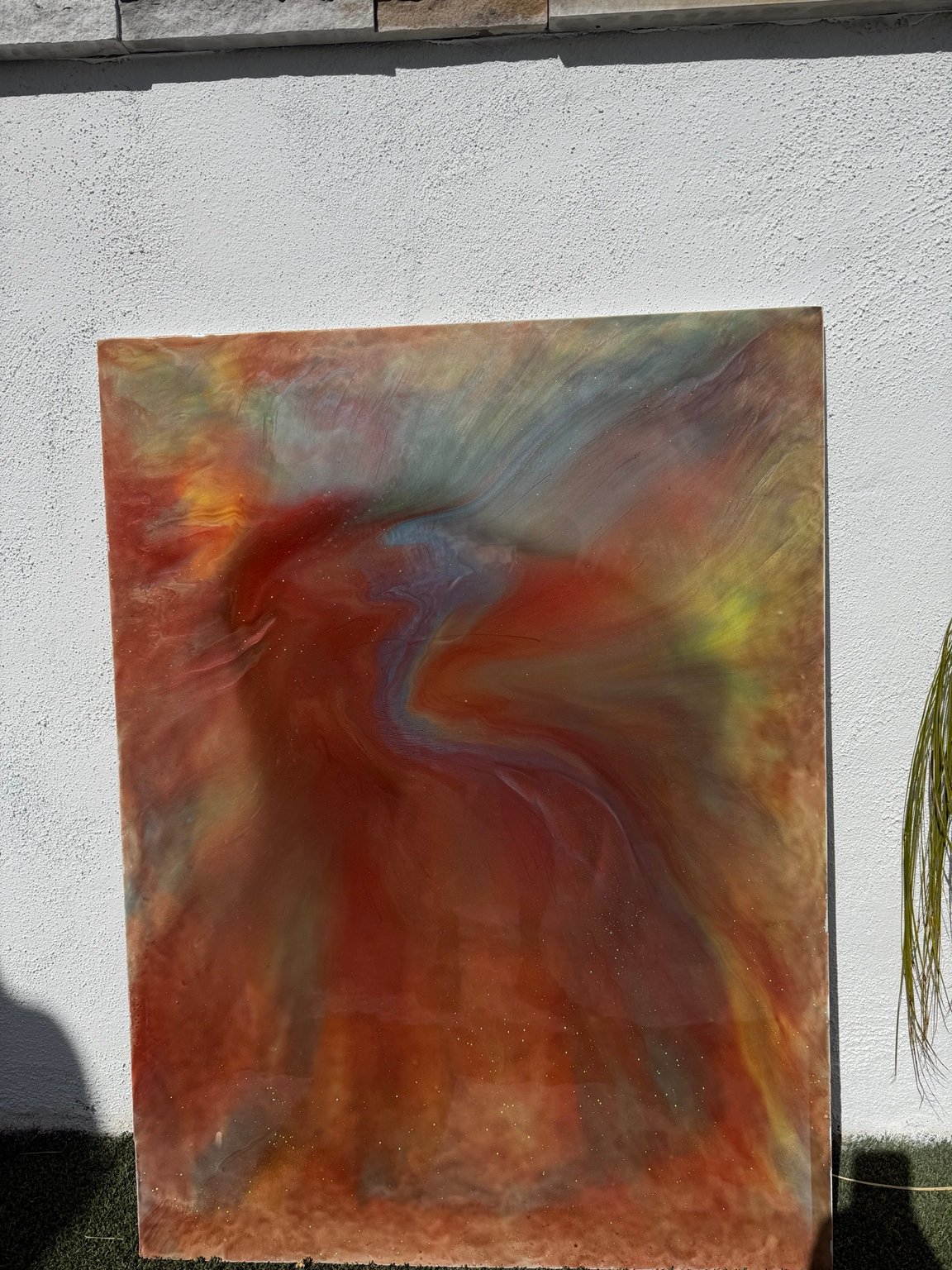 Original photograph of a Resinart Finishes resin artwork with rust, gold, blue-gray and violet movement